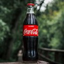 A Coca-Cola não divulgou como será realizado o ajuste da receita do refrigerante. - Foto: Unsplash