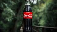 A Coca-Cola não divulgou como será realizado o ajuste da receita do refrigerante. - Foto: Unsplash